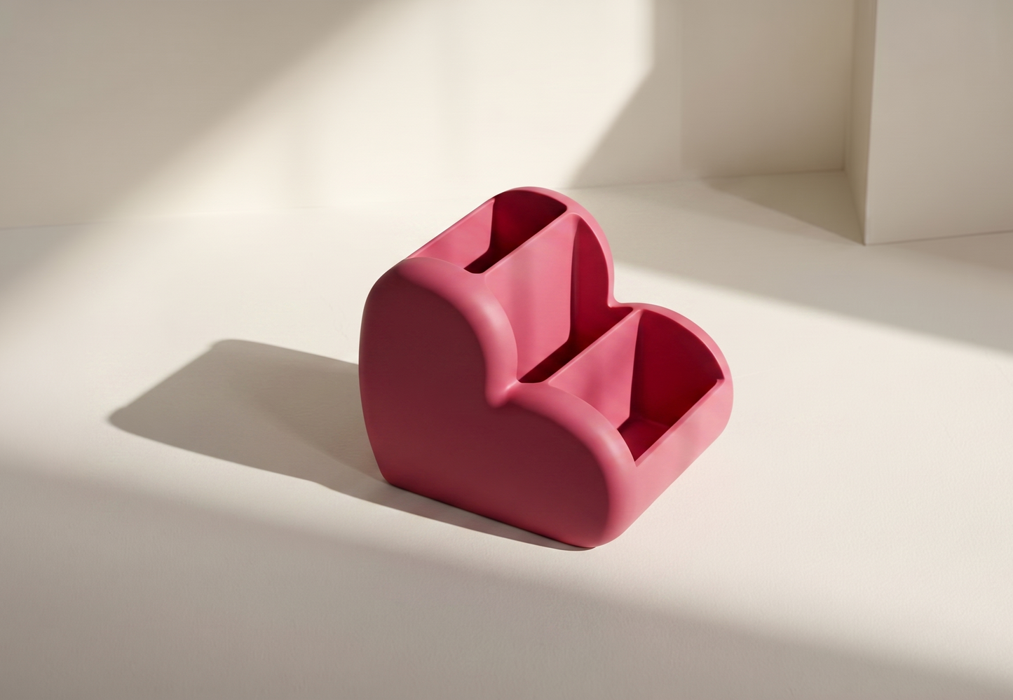 Heart-shaped makeup organizer holding brushes