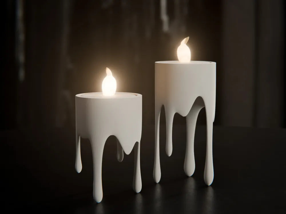 Pair of dripping candle holders with melting wax effect