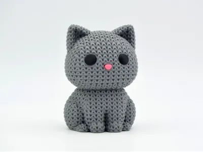 Knitted-style cat figure with crochet texture